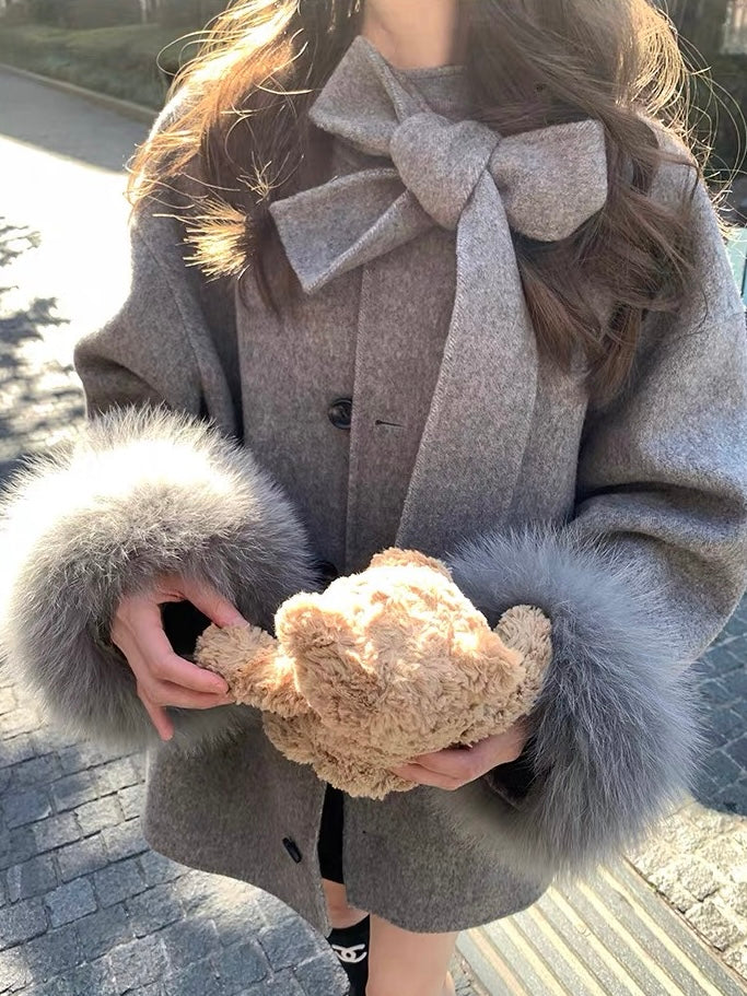 フェミニンリボンファーコート Mc 563