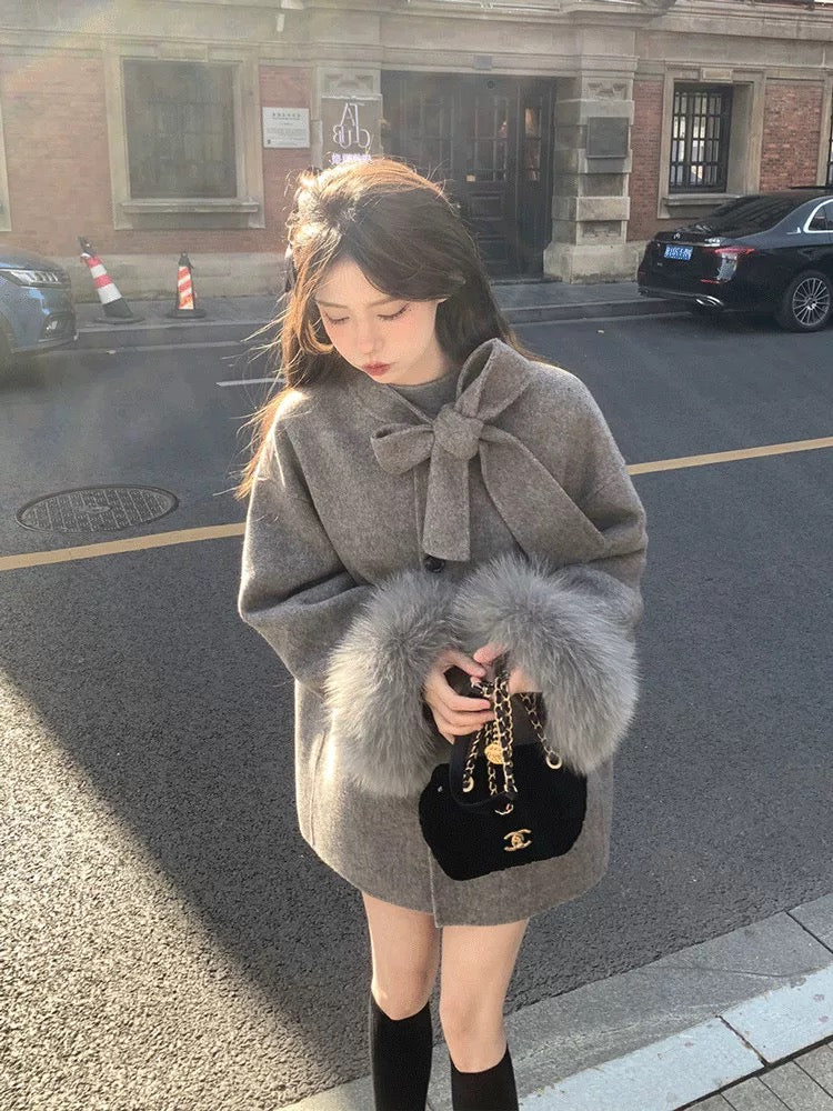 フェミニンリボンファーコート Mc 563