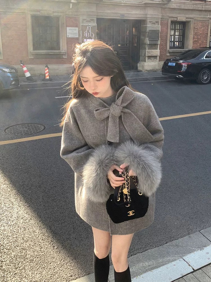 フェミニンリボンファーコート Mc 563