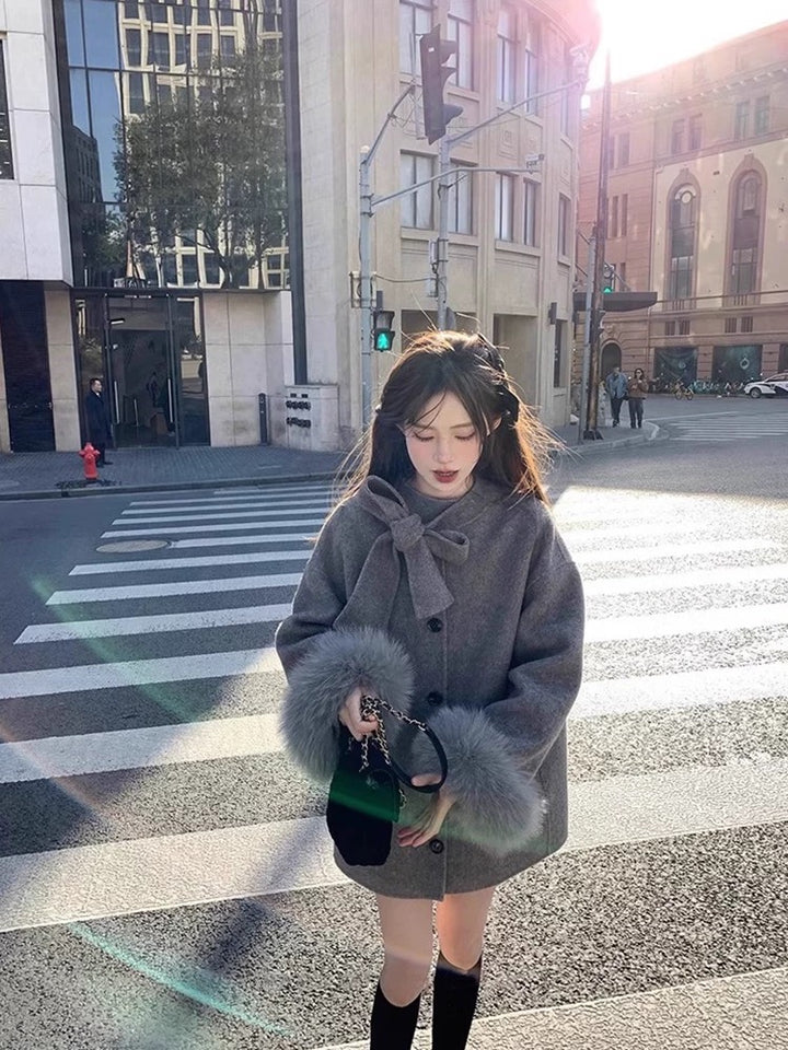 フェミニンリボンファーコート Mc 563