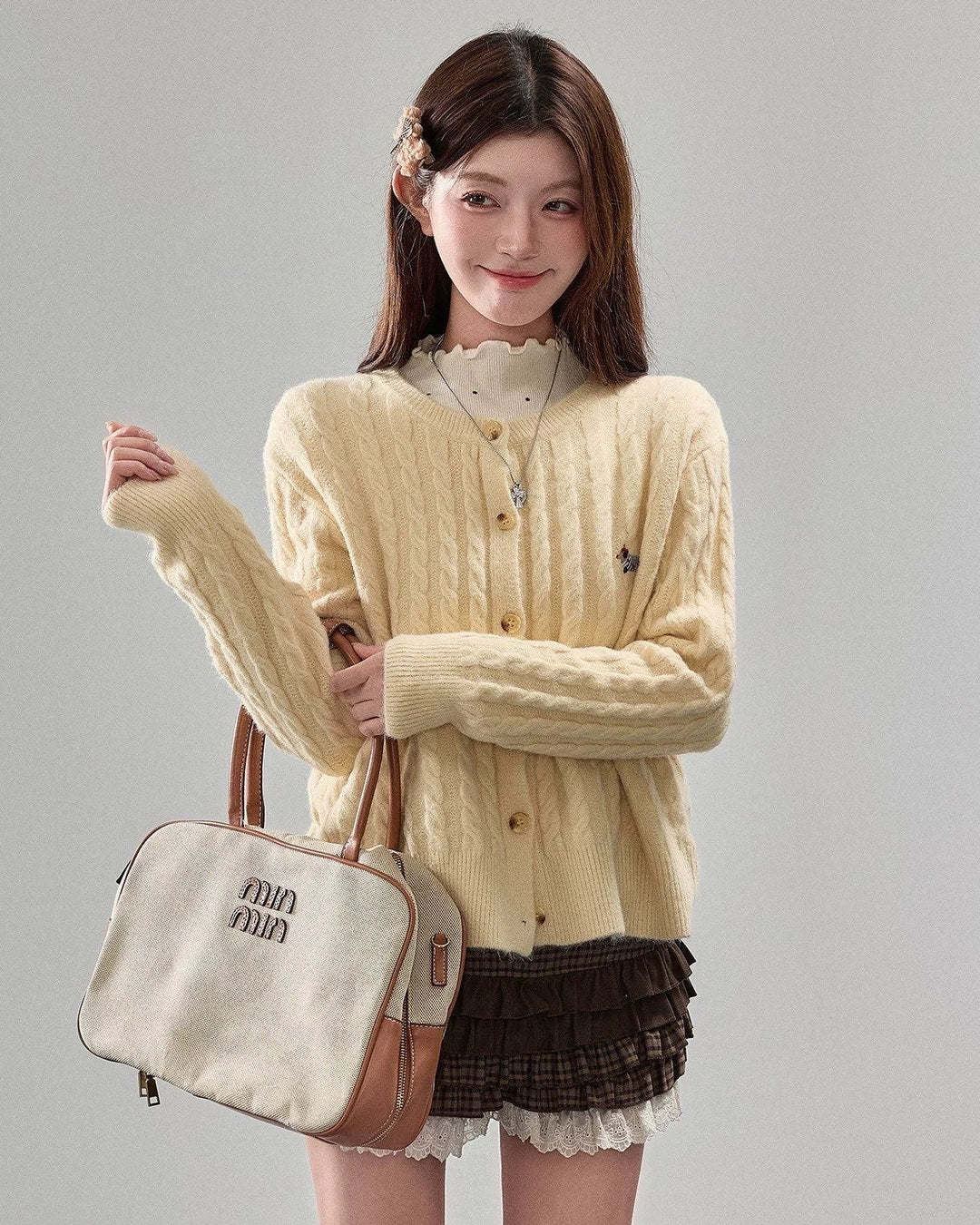 ケーブルニット刺繍カーディガン Mc 575